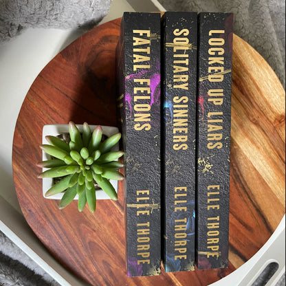 Saint View Prison — Discreet Special Edition Gold Foil Signed Paperbacks with sprayed edges.