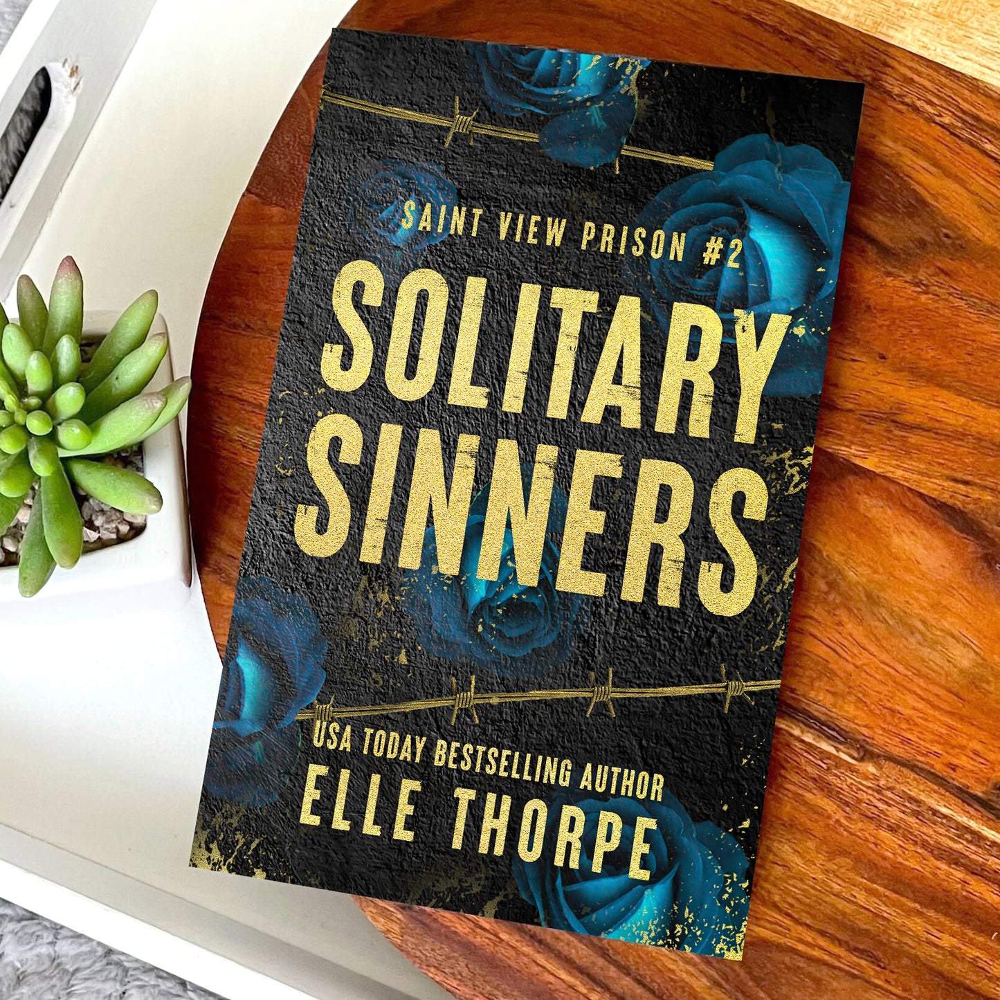 Saint View Prison — Discreet Special Edition Gold Foil Signed Paperbacks with sprayed edges.